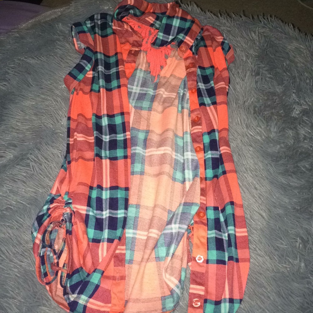 Orange and blue vest with lace back